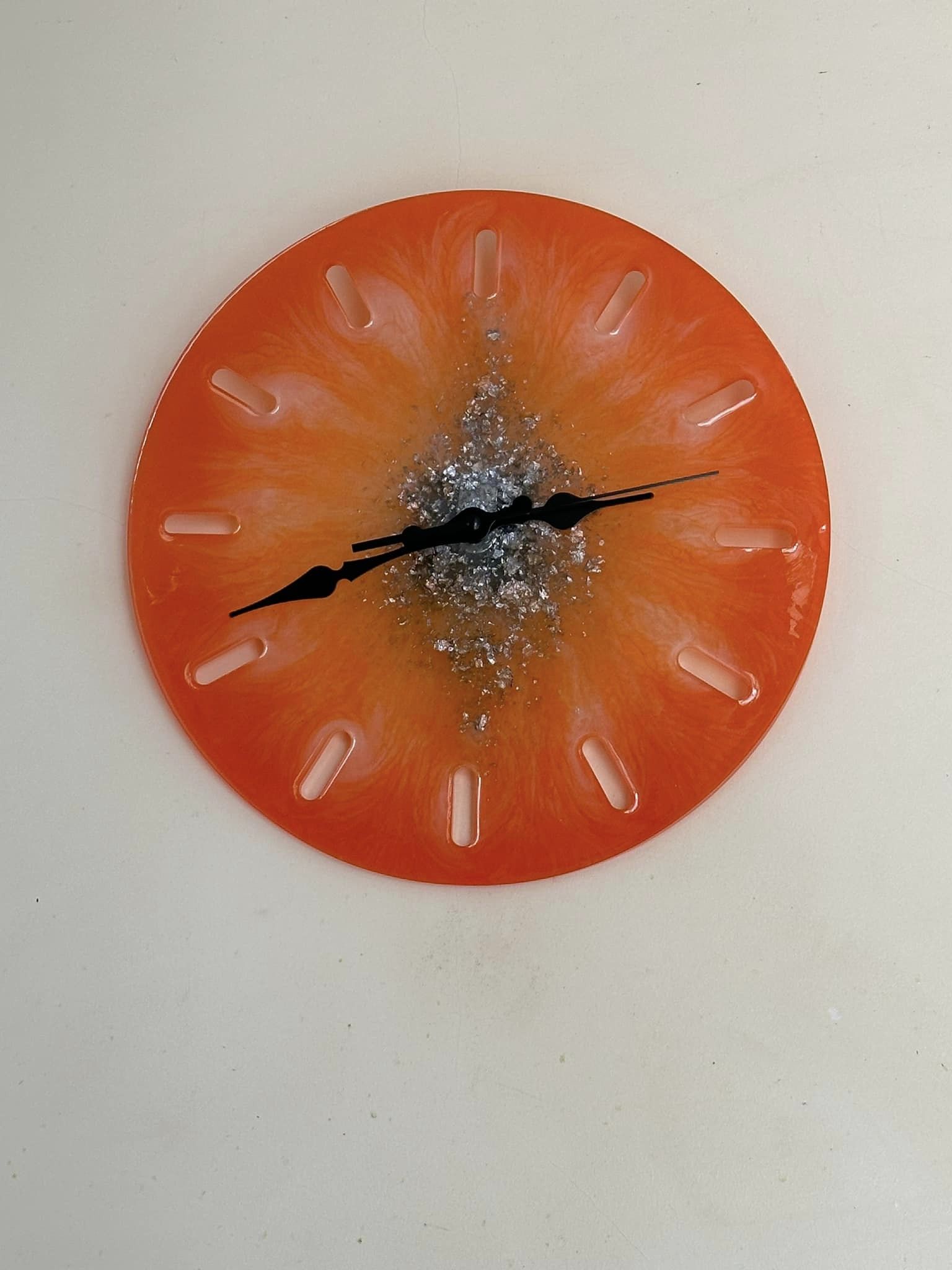 Clock orange wall